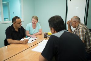 Sister Heather Stiverson helps unemployed refugees with their English skills.